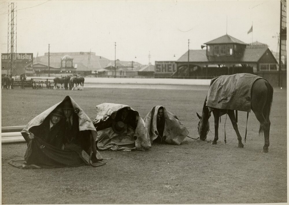 Men Sheltering Under Tarpaulins, 1936
