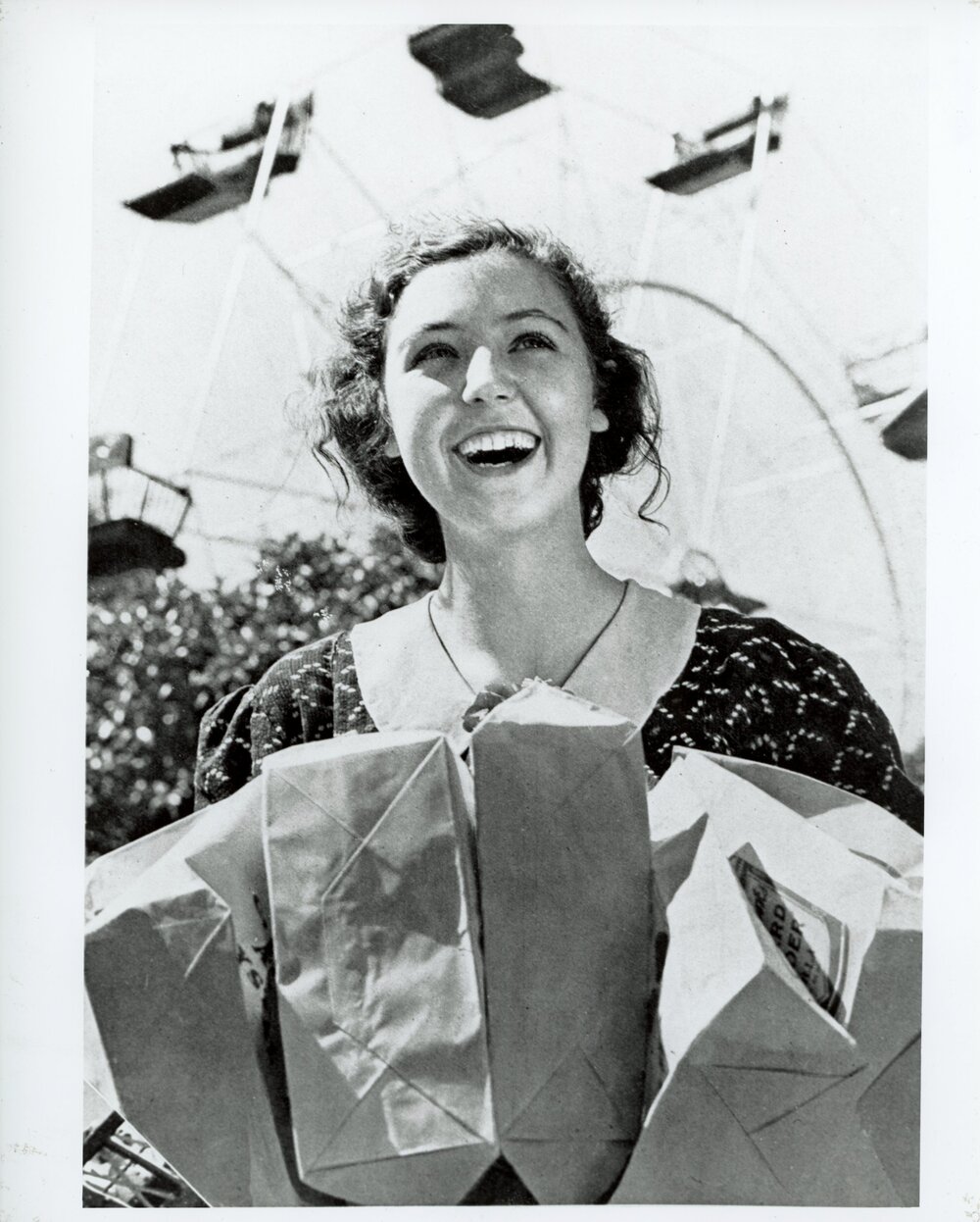 Girl Holding Showbags at the Sydney Royal Easter Show, c.1937